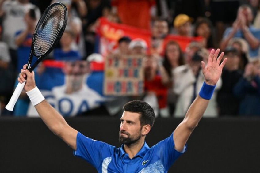 Novak Djokovic celebrates after victory against Portugal's Jaime Faria