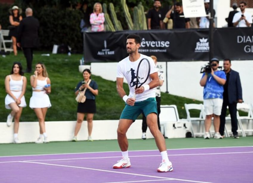 World number one Novak Djokovic plays in an exhibition prior to the Indian Wells WTA and A