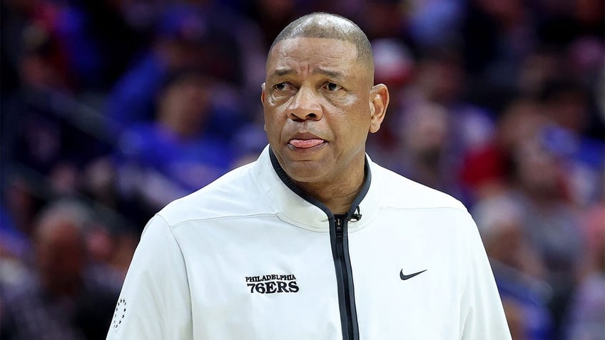 Doc Rivers coaches against the Boston Celtics