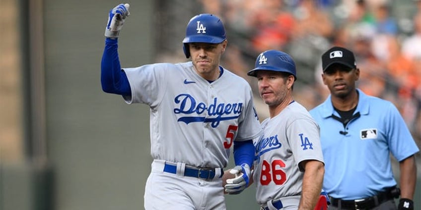 dodgers continue winning ways with rout of orioles