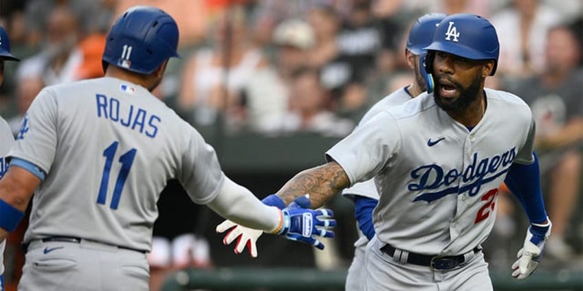 dodgers continue winning ways with rout of orioles