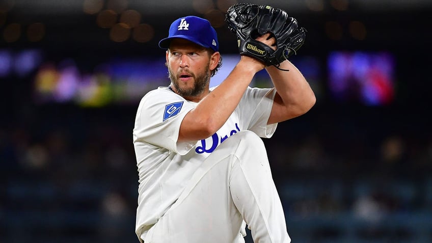 Clayton Kershaw throws pitch