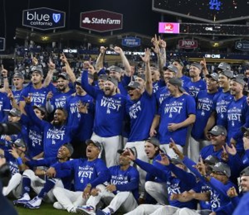 Dodgers, Yankees win final two division titles, but four MLB playoff spots remain