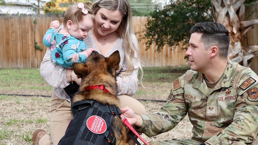 John reunites with SSgt. Mike Acala and his wife Brittany Alcala