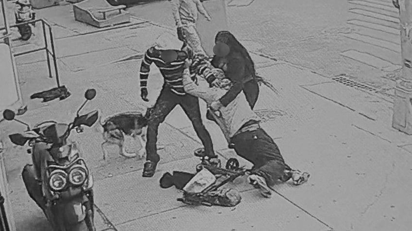 People fighting on the street