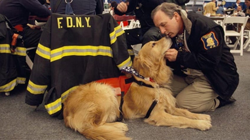 Frank Shane and Nikie, therapy dog, in NYC after 9/11