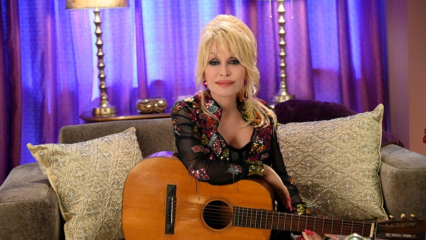 dolly parton says signature style was inspired by provocative lingerie catalogs