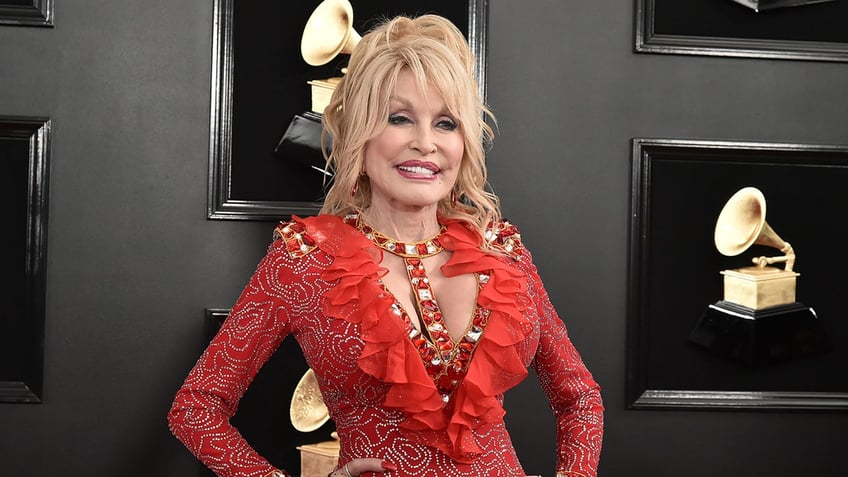 dolly parton says signature style was inspired by provocative lingerie catalogs