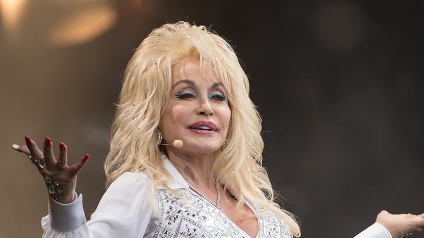 dolly parton shares the only reason shed be caught without makeup it would have to be pretty serious