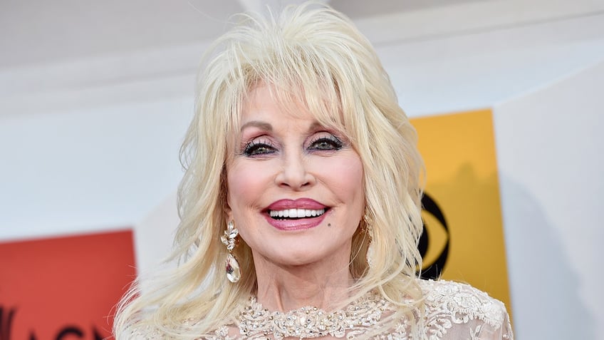 dolly parton shares the only reason shed be caught without makeup it would have to be pretty serious