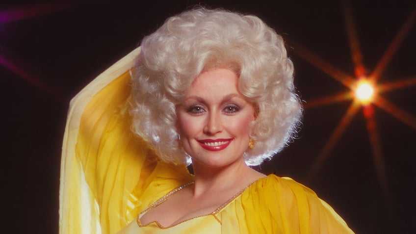 dolly parton shares the only reason shed be caught without makeup it would have to be pretty serious