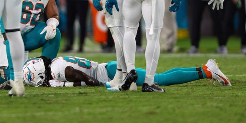 dolphins jaguars game suspended after daewood davis suffers scary injury