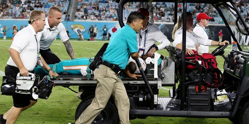 dolphins jaguars game suspended after daewood davis suffers scary injury