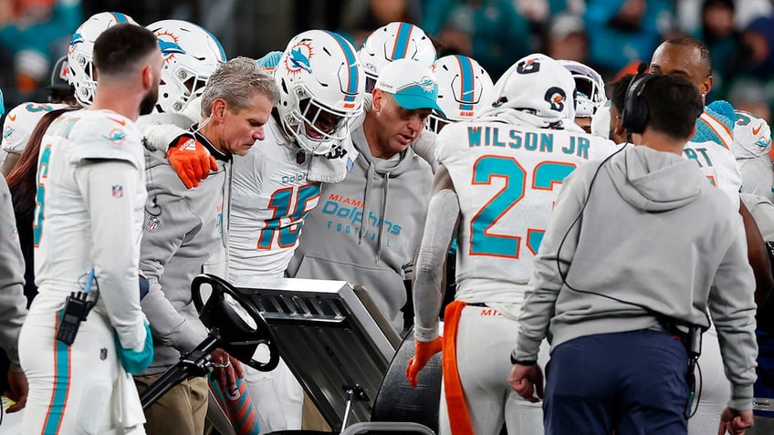 dolphins jevon holland rips stadiums trash turf after jaelan phillips suffered apparent achilles injury