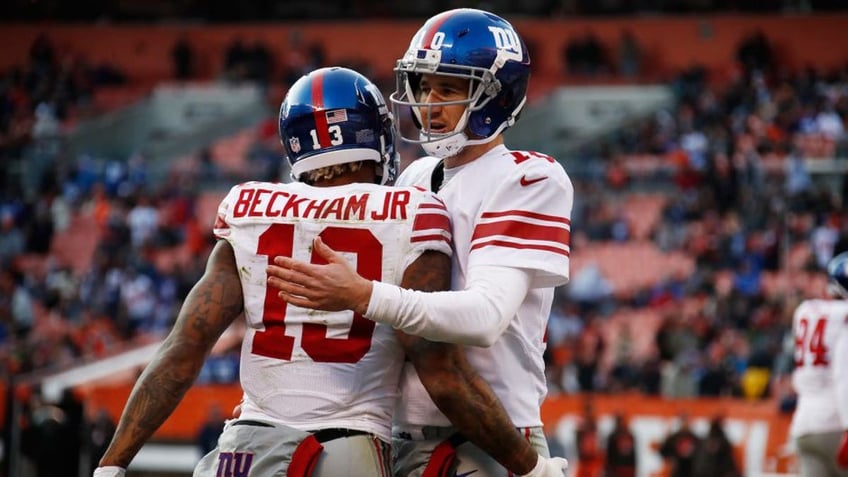 Odell Beckham celebrates with Eli Manning