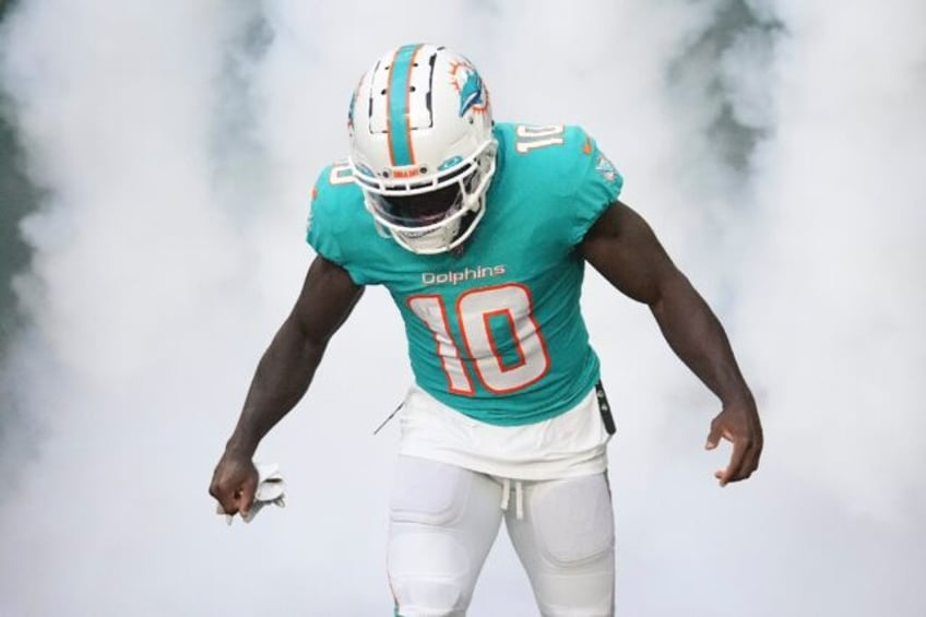 Miami Dolphins receiver Tyreek Hill was arrested by traffic police en route to Sunday's ga