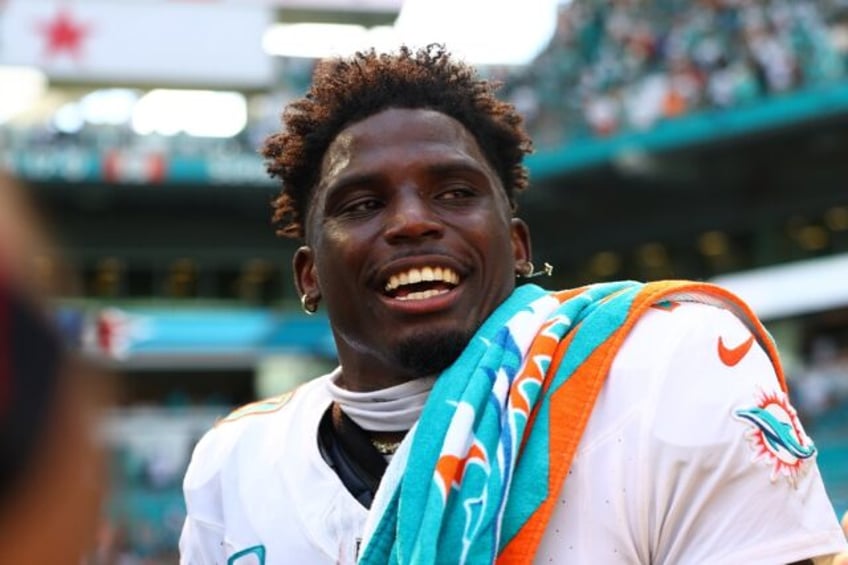 Miami Dolphins receiver Tyreek Hill reacts after his team's NFL win over the Jacksonville