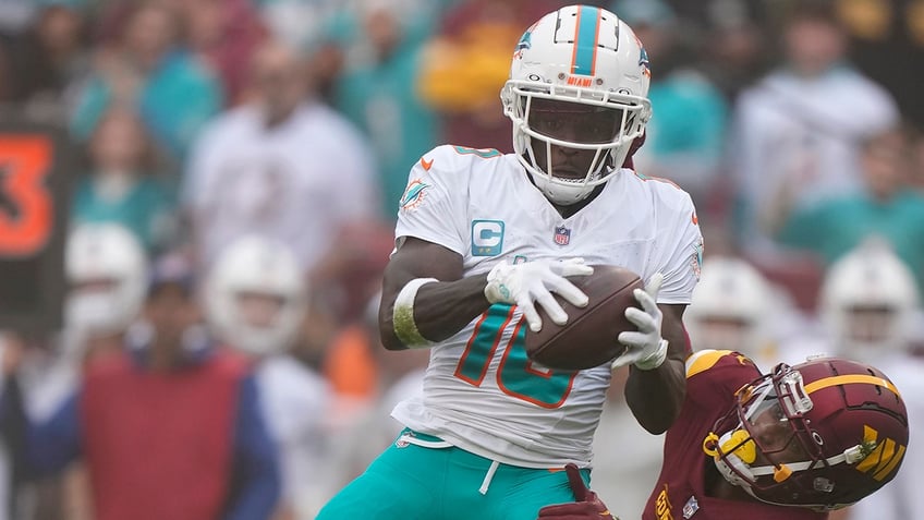 dolphins tyreek hill has nfl record in sights with big game against commanders