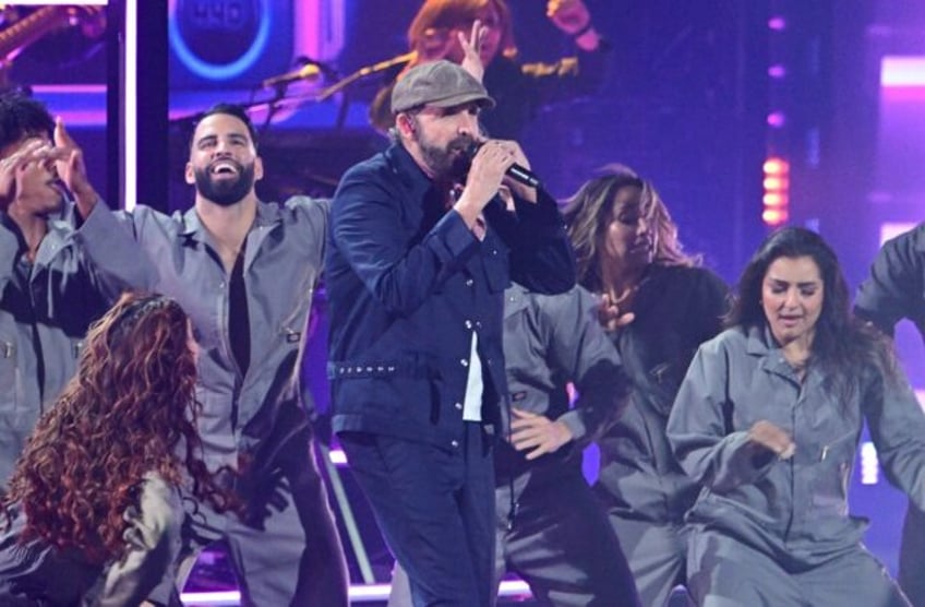 Dominican singer Juan Luis Guerra performs during the 25th Annual Latin Grammy Awards at t