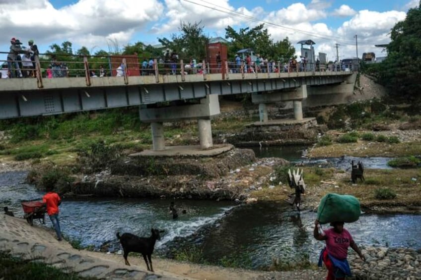 dominican republic has partially reopened its border with haiti but a diplomatic crisis persists