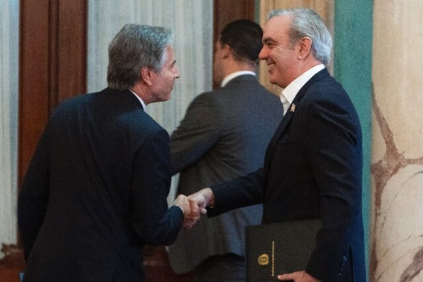 US Secretary of State Antony Blinken shakes hands with President of the Dominican Republic