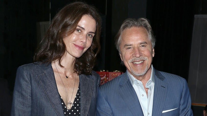 Kelley Phleger and Don Johnson posing together