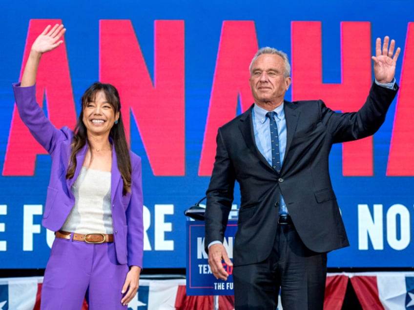 Robert F. Kennedy Jr., partner with Morgan & Morgan PA and 2024 independent presidential candidate, right, and Nicole Shanahan, 2024 independent vice presidential candidate, during a campaign event in Oakland, California, US, on Tuesday, March 26, 2024. Robert F. Kennedy Jr. is tapping philanthropist and technology entrepreneur Nicole Shanahan as his running mate, a move that offers to boost his independent presidential bid among women and Democratic voters. Photographer: David Paul Morris/Bloomberg via Getty Images