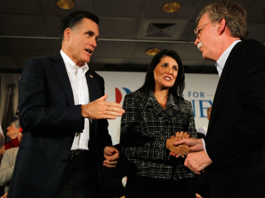 HILTON HEAD ISLAND, SC - JANUARY 13: Republican presidential candidate, former Massachusetts Gov. Mitt Romney (L), South Carolina Gov. Nikki Haley (C), a Republican, and former Ambassador to the United Nations John Bolton attend a campaign rally together at the Hilton Oceanfront Resort on January 13, 2012 in Hilton Head Island, South Carolina. Romney continues to campaign for votes in South Carolina ahead of their primary on January 21. (Photo by Joe Raedle/Getty Images)