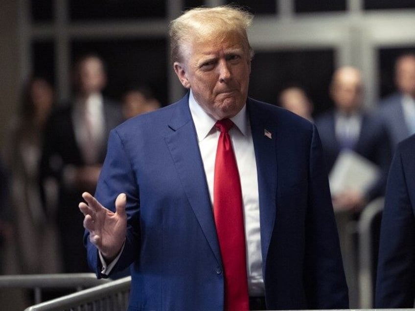 Former President Donald Trump speaks to the media outside of court during his business rec