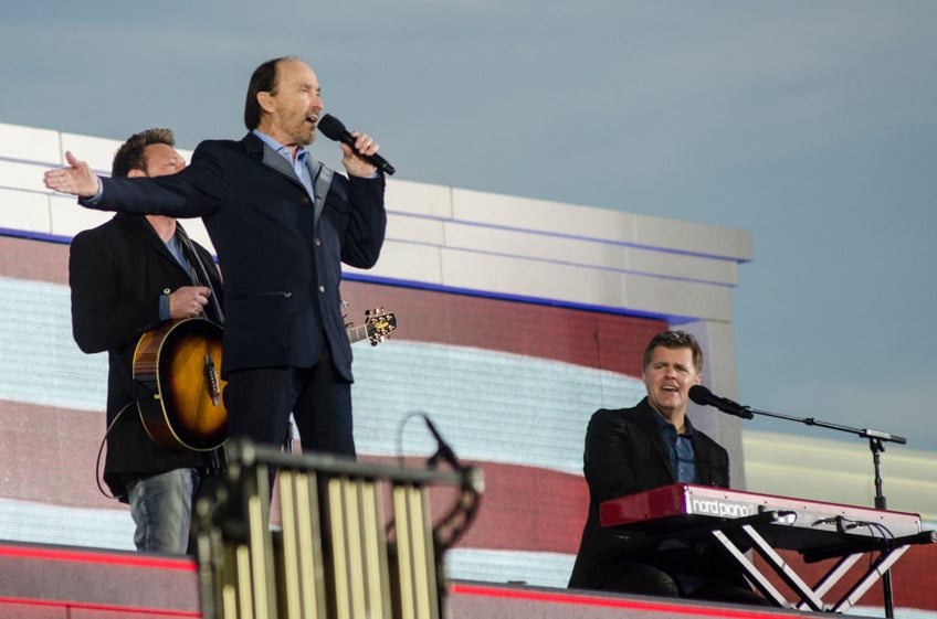 donald trump teams with country music star lee greenwood on new god bless the usa bible edition