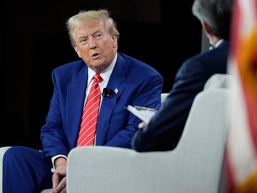 Republican presidential nominee former President Donald Trump speaks during an interview w