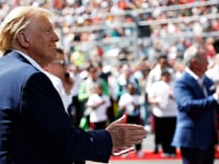 Donald Trump waves to crowd, salutes during national anthem at F1 Miami Grand Prix