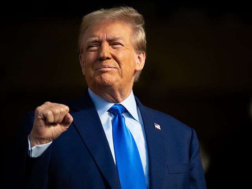 Republican presidential candidate former U.S. President Donald Trump looks on during a campaign ral