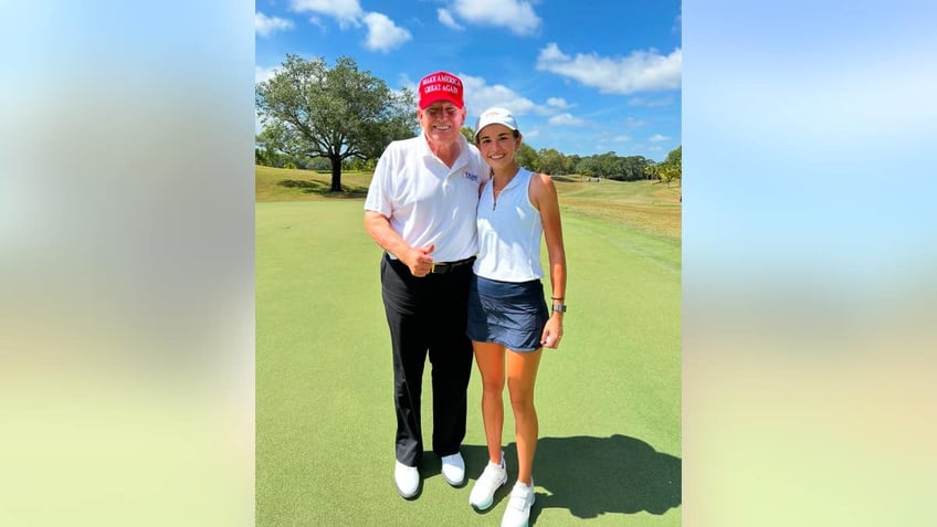 kai trump and donald trump on golf course