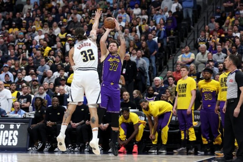 Luka Doncic shot over Aaron Gordon to help the Los Angeles Lakers rout the Denver Nuggets