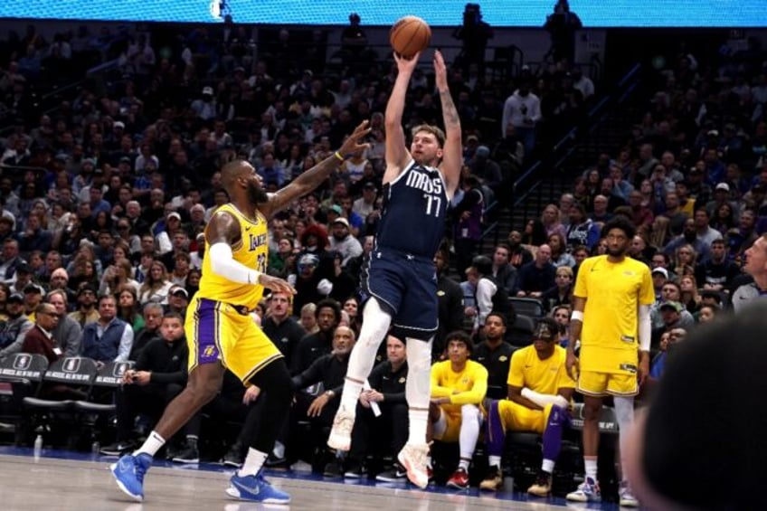 Dallas's Luka Doncic shoots over LeBron James in the Mavericks victory over the Los Angeles Lakers on Tuesday