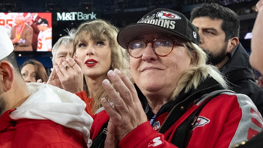 Taylor Swift stands with Donna Kelce, right, after an AFC Championship NFL football game between the Kansas City Chiefs and the Baltimore Ravens on Sunday, Jan. 28, 2024 in Baltimore.