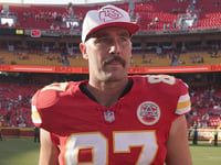 Donna Kelce shows off message son Travis wrote on her jersey before first game