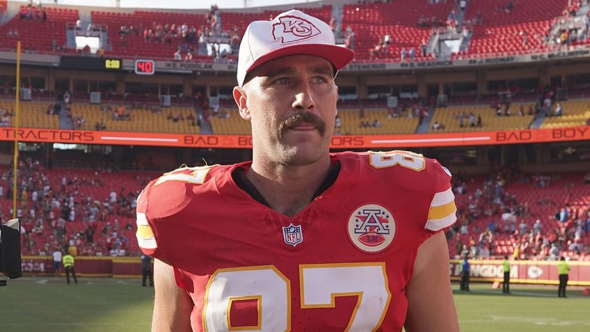 Travis Kelce looks on