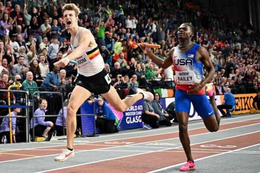 Belgium's Alexander Doom (L) crosses the finish line past USA's Chris Bailey to win the me