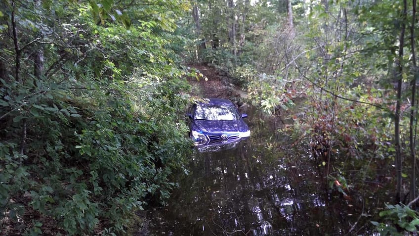 doordasher delivering dunkin drives into water after allegedly following gps charges filed