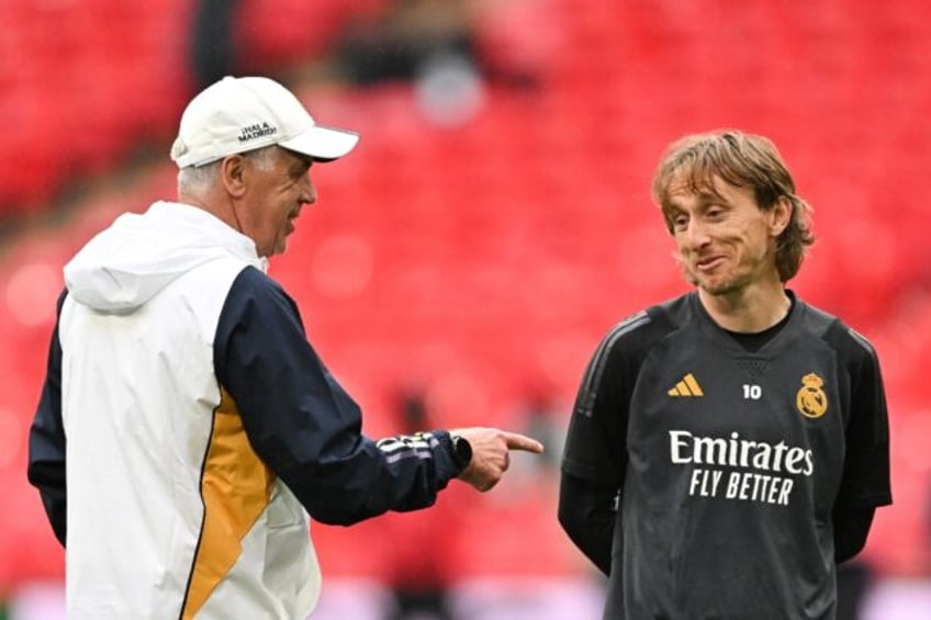Luka Modric (right) can win the Champions League for the sixth time with Real Madrid on Sa