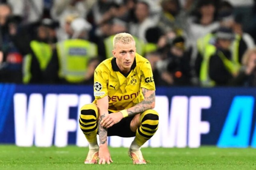 Marco Reus was left dejected by Dortmund's defeat in his last game for the club - his depa