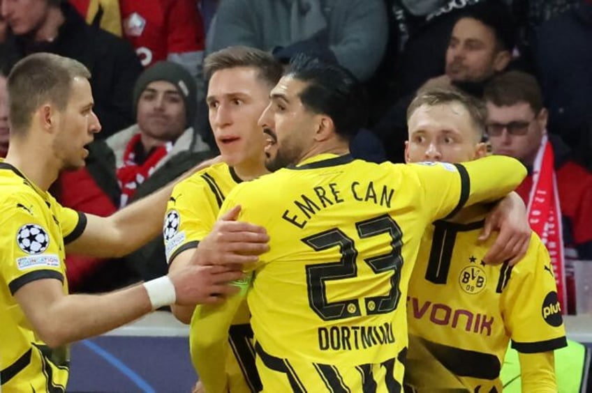 Borussia Dortmund came from behind to beat Lille 2-1 in France on Wednesday and win their