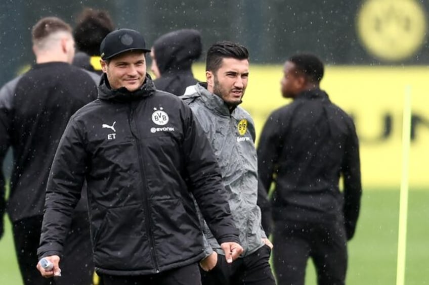 Edin Terzic (L) and Nuri Sahin take a Dortmund training session on the eve of their UEFA C