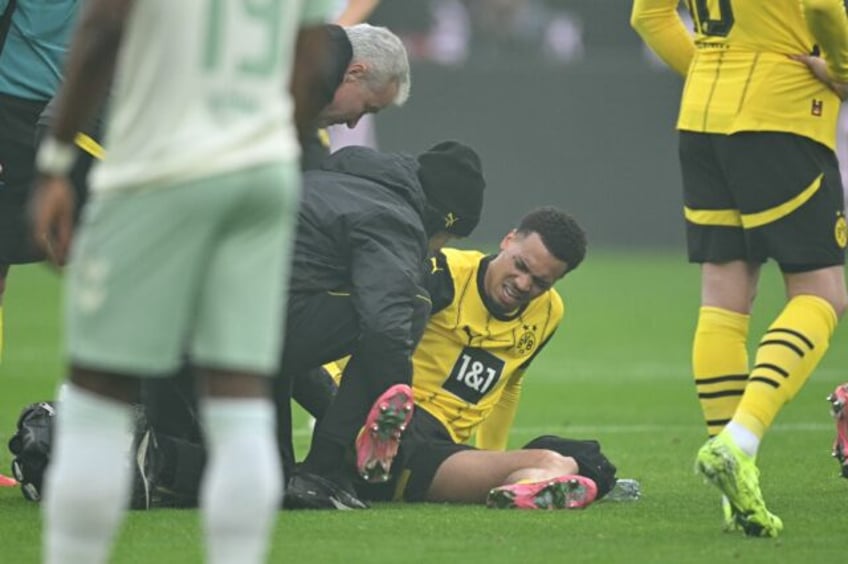 Dortmund's German midfielder Felix Nmecha went down after a challenge and was subbed out 1