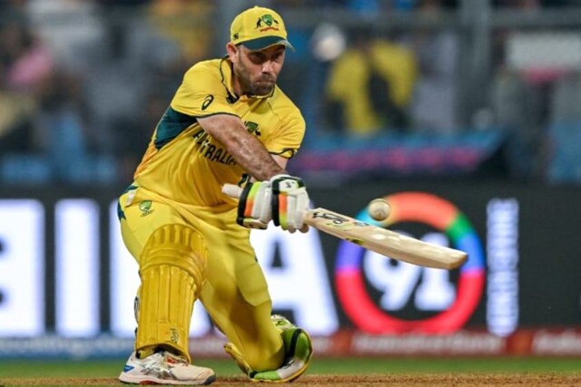 double ton maxwell downs afghanistan as australia reach world cup semis