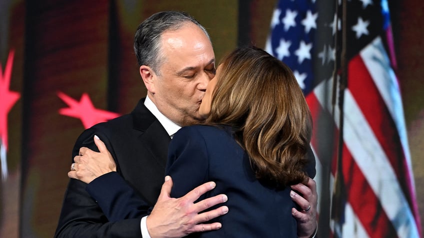 Doug Emhoff and Kamala Harris kiss