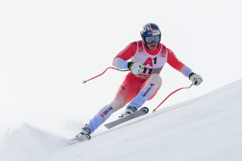 Switzerland's Franjo von Allmen en route to winning gold in the men's downhill at the worl