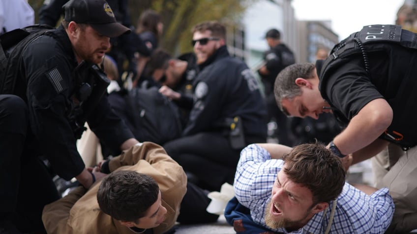 dozens arrested outside white house during protest over israel hamas war